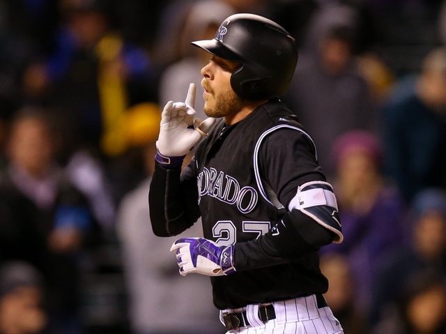 Story homers, drives in 4 as Rockies beat Mariners 10-7