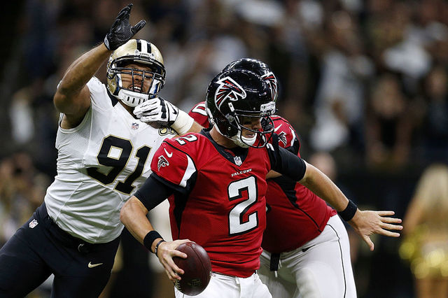 Broncos sign free agent defensive end Kasim Edebali