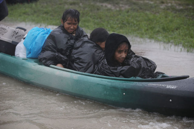 Here's how to avoid scammers preying on your desire to help Harvey victims