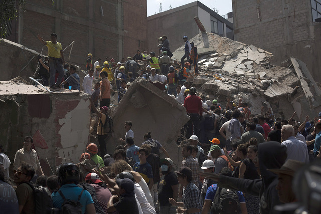 Mexico quake rescuers struggle to free girl, other survivors