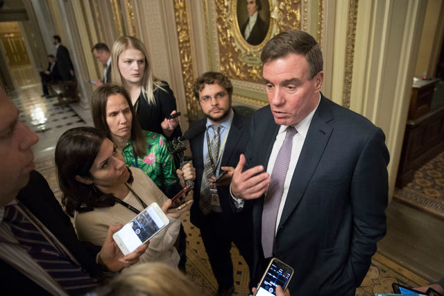 Sen. Warner cautions Trump against meddling in Mueller probe