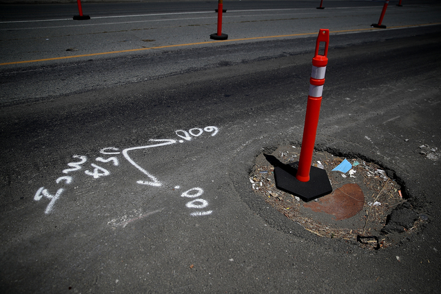 Aurora is awarding $50 gift certificates to residents who report the biggest pothole